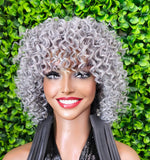 Elevate your everyday look with this beautiful gray human hair blend wig featuring soft layered curls and a natural, voluminous finish. Designed with a sophisticated salt and pepper gray tone, this wig delivers timeless beauty with modern glam styling.
Color shown: Gray (There are other colors available)

The lightweight human hair blend fibers provide a soft, natural texture while maintaining bounce, body, and movement. Perfect for women looking for an elegant gray hairstyle that offers both comfort and st