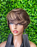 Pixie Cut Swoop Bang Glueless Wig Human Hair | Short Layered Bob| Beginner Friendly Ready to Wear | Soft Full Density Hair Unit
Upgrade your look with this easy-to-wear glueless wig designed for maximum comfort and simplicity. Made with soft swoop bang, layered pixie cut, high-quality human hair, this piece delivers a natural appearance with beautiful movement and volume; no lace or adhesive needed. This is not a lace wig.
Color shown: 4/27(Chocolate/Strawberry Blonde Mix)

The beginner-friendly design make